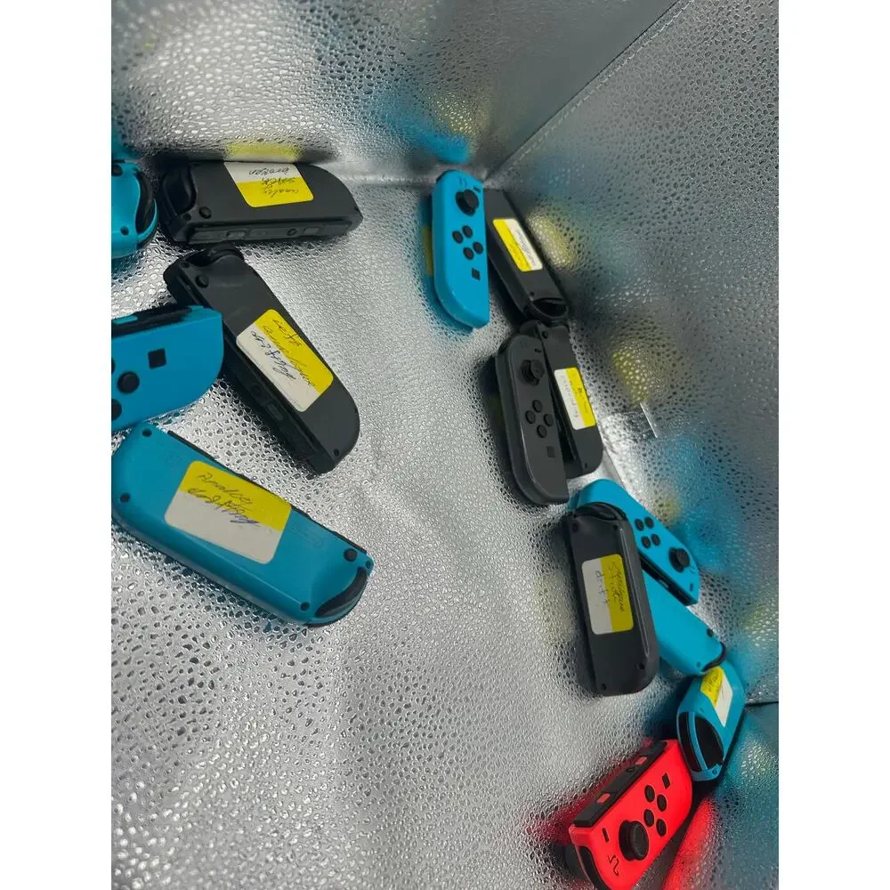 nintendo switch right  joycons as pictured for parts or repair